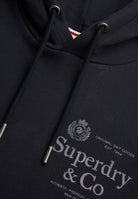 Superdry 1954 Company Relaxed Hoodie in Dark Navy hood and logo detail