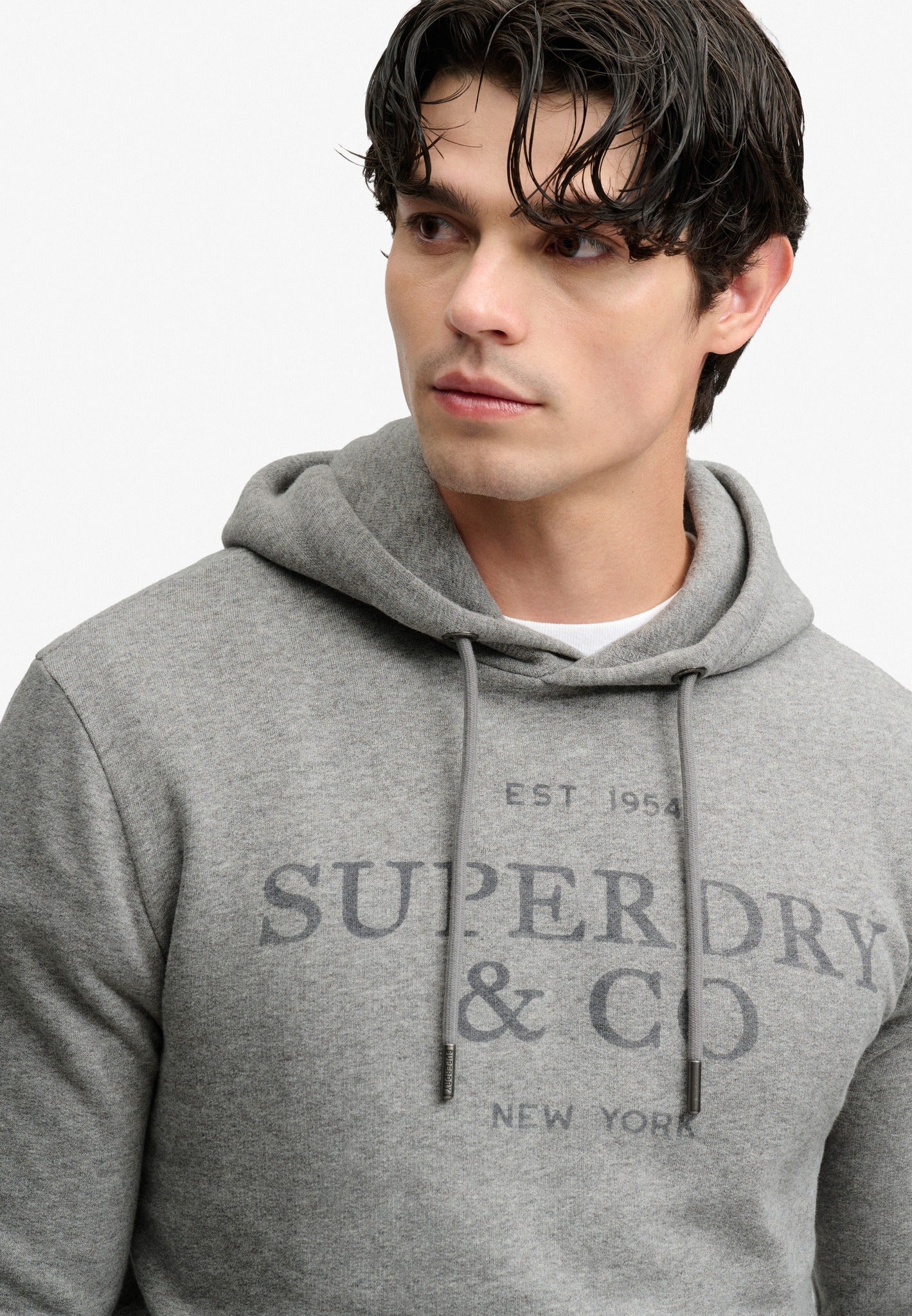 Superdry 1954 Company Relaxed Hood in Dark Vintage Grey Marl angled model view