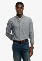 Superdry Preppy Poplin Long Sleeve Shirt in Navy Micro Houndstooth on model