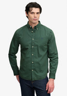 Superdry Garment Dyed Long Sleeve Shirt in Tumbled Green on model