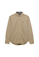 Superdry Garment Dyed Long Sleeve Shirt in Tumbled Tan angled view