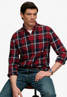 Superdry Long Sleeve Cotton Lumberjack Shirt in Peyton Check Eclipse Navy seated model view