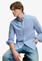 Superdry Preppy Oxford Long Sleeve Shirt in Broker Blue Stripe seated view