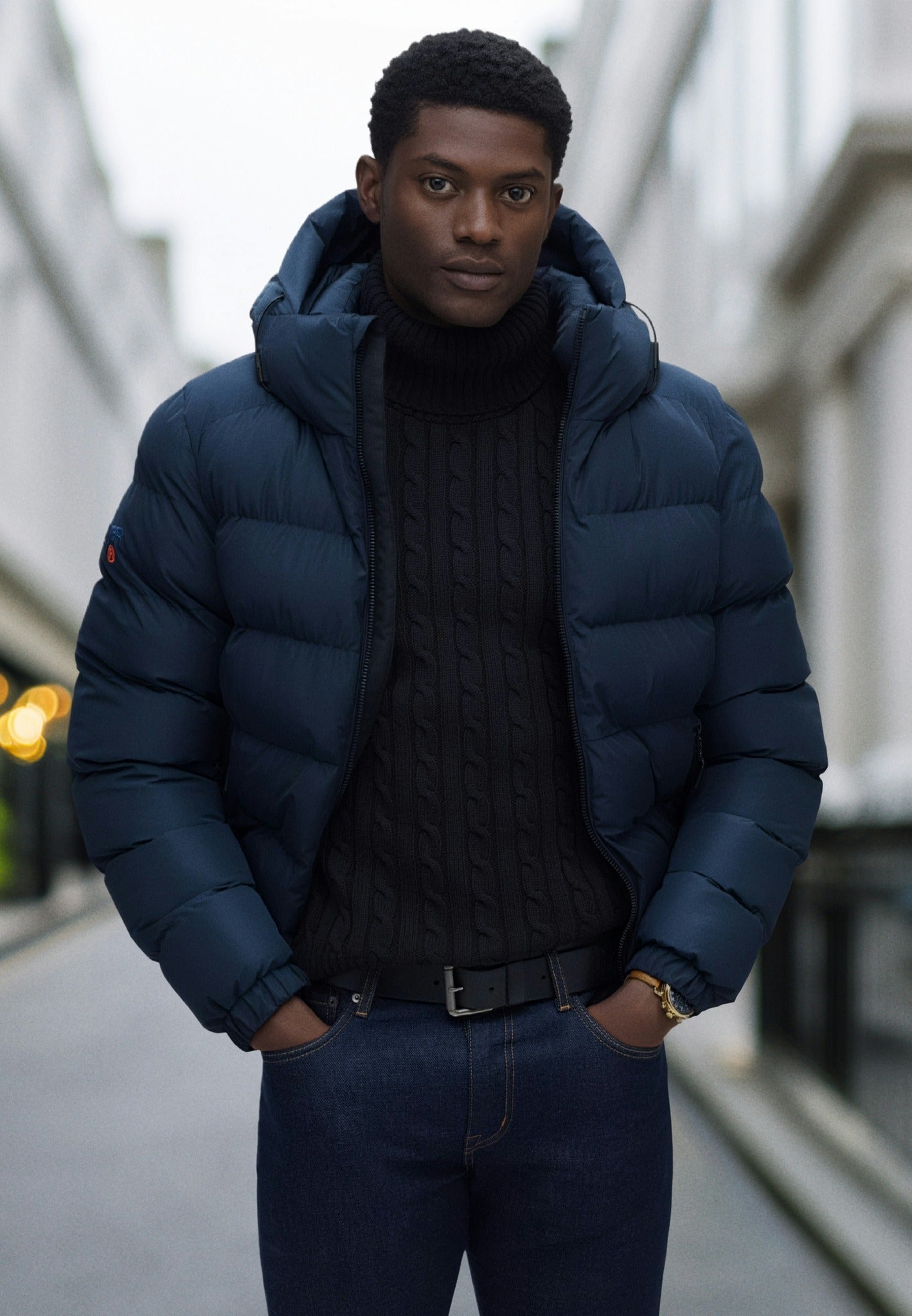 Superdry Hooded Sports Puffer Jacket - Eclipse Navy in Eclipse Navy/Eclipse Navy lifestyle model view