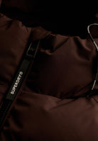 Superdry Hooded Sports Puffer Jacket in Peak Dark Plum zip and drawcord detail