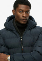 Superdry Hooded Sports Puffer Jacket - Eclipse Navy in Eclipse Navy/Eclipse Navy front model view