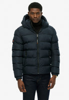 Superdry Hooded Sports Puffer Jacket - Eclipse Navy in Eclipse Navy/Eclipse Navy half model view