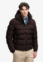 Superdry Hooded Sports Puffer Jacket in Peak Dark Plum on model