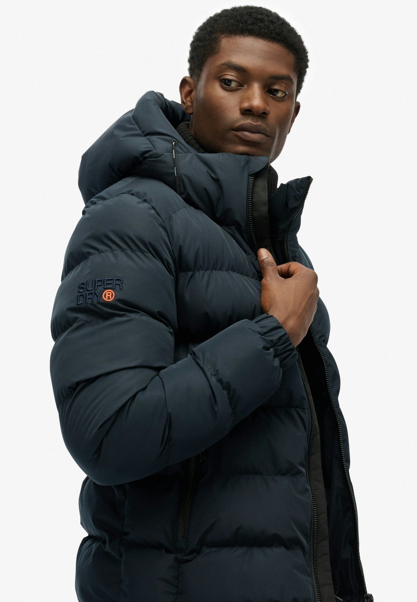 Superdry Hooded Sports Puffer Jacket - Eclipse Navy in Eclipse Navy/Eclipse Navy angled model view