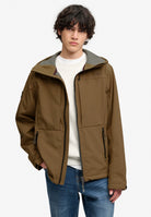 Superdry Hooded Softshell Trekker Jacket in Peak Sands Beige on model