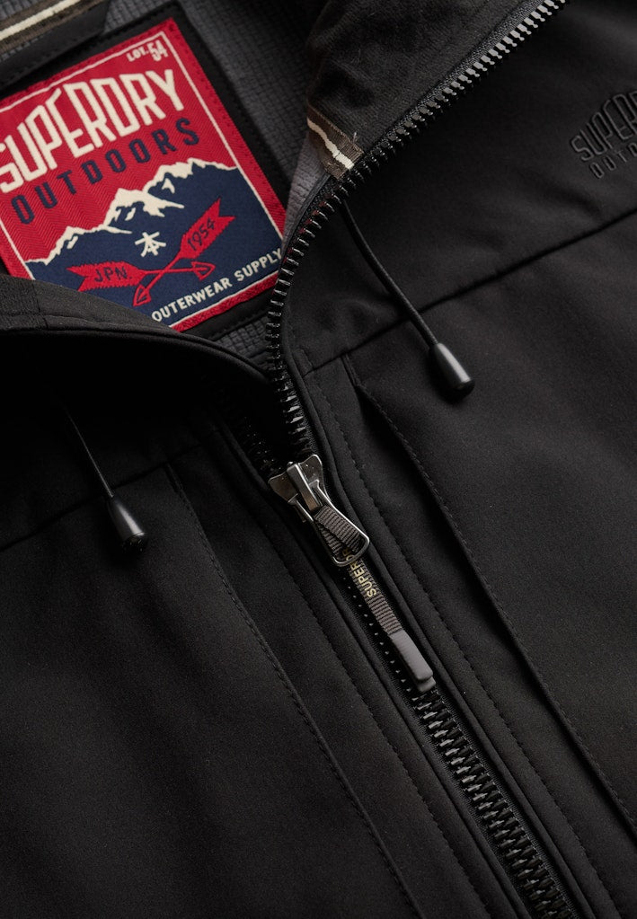 Superdry Hooded Softshell Trekker Jacket in Black zip and logo detail