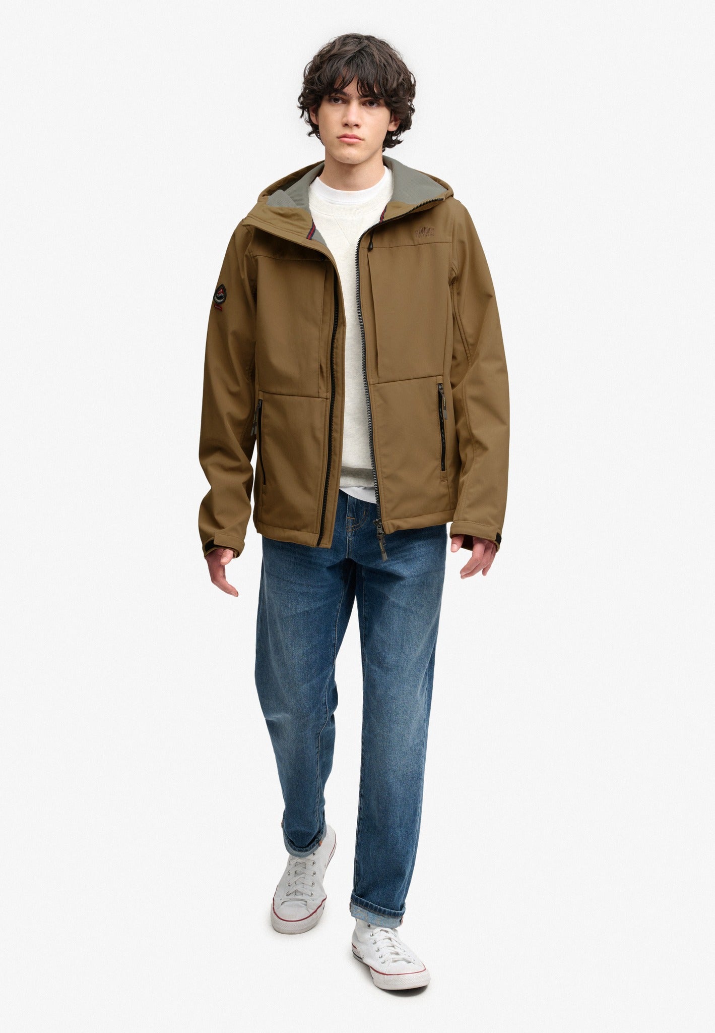 Superdry Hooded Softshell Trekker Jacket in Peak Sands Beige full length view