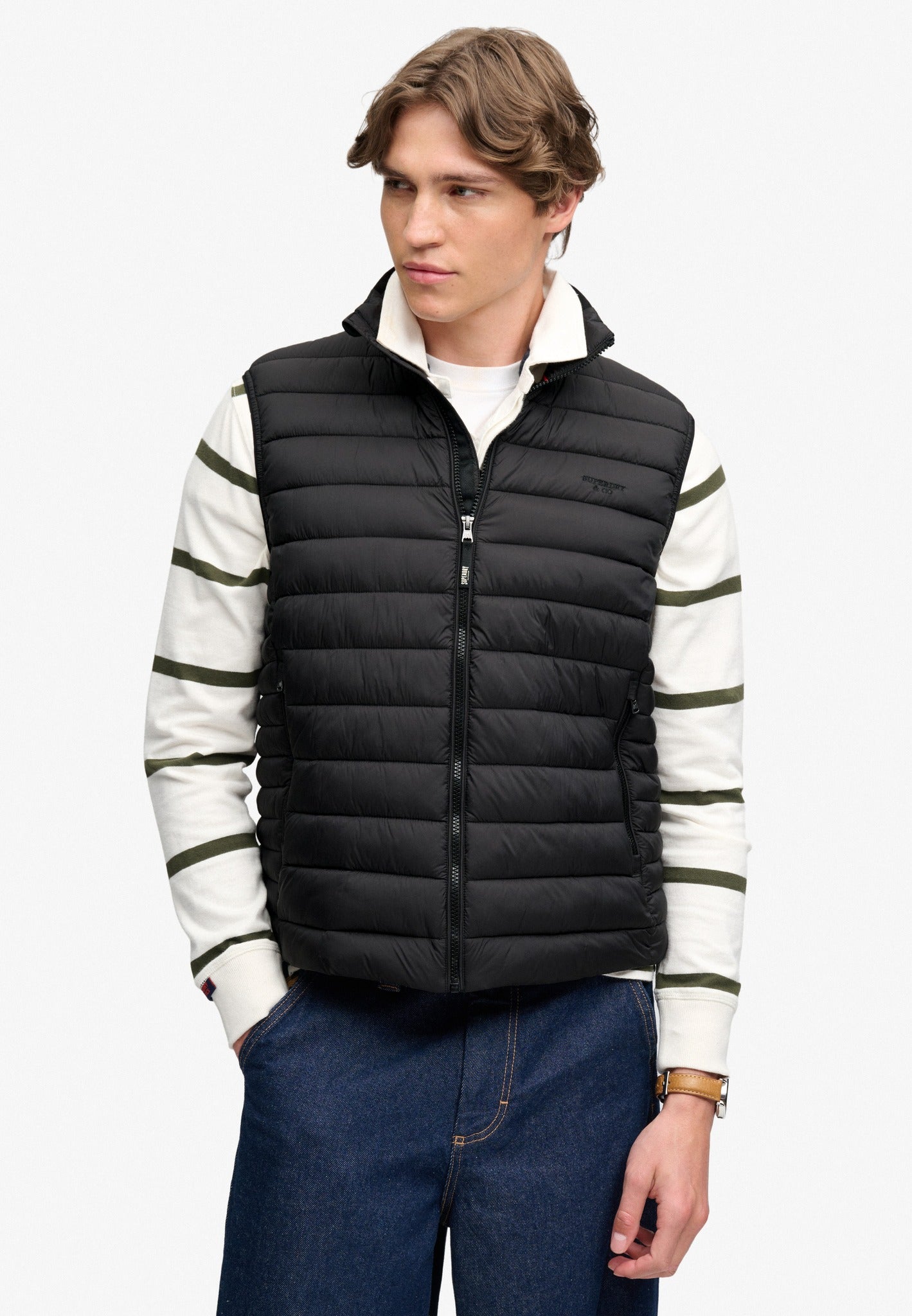 Superdry Fuji Lite Padded Gilet in Black angled model view
