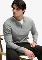 Superdry grey grit marl long sleeve grandad top seated model view
