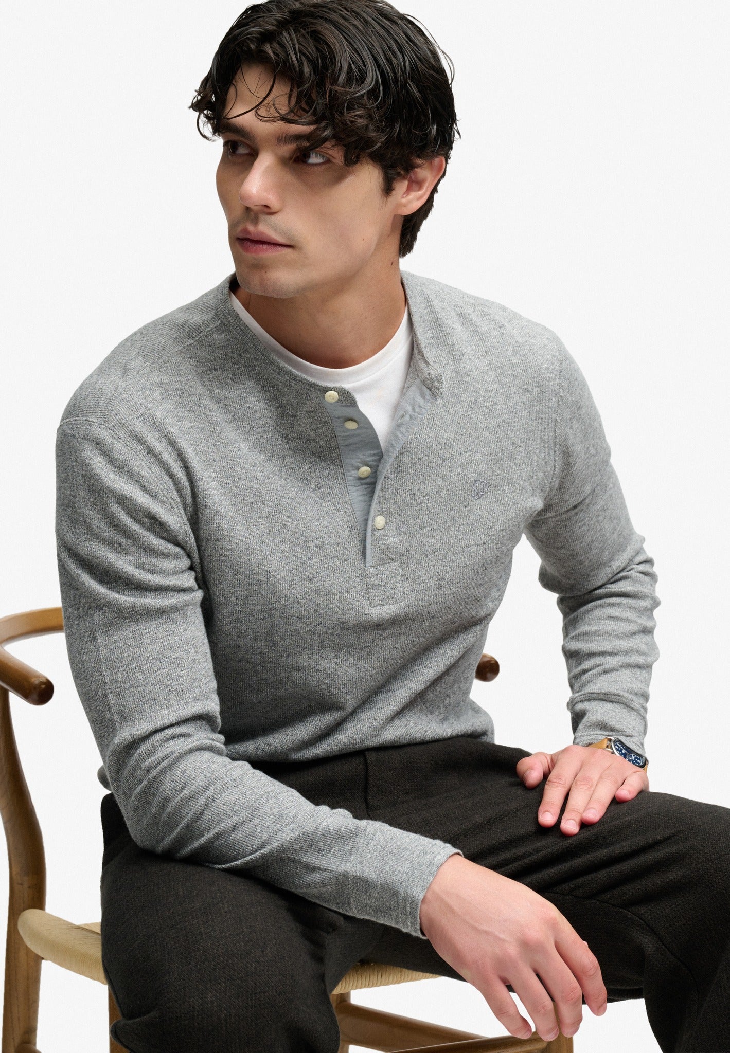 Superdry grey grit marl long sleeve grandad top seated model view