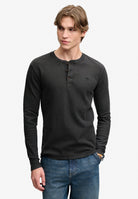 Superdry Waffle Long Sleeve Henley Top in Washed Black on model