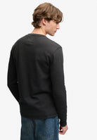 Superdry Waffle Long Sleeve Henley Top in Washed Black back view on model