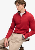 Superdry Prep Essential Cotton Half Zip in Crimson Red Marl seated view