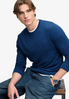 Superdry Prep Essential Cotton Jumper in Pilot Blue Marl seated view