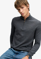 Superdry Essential Lightweight Wool Blend Half Zip Jumper in Iron Grey Marl seated model view