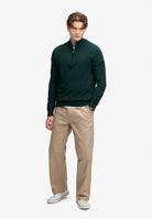 Superdry Essential Lightweight Wool Blend Half Zip Jumper in Deep Pine Green full length model view