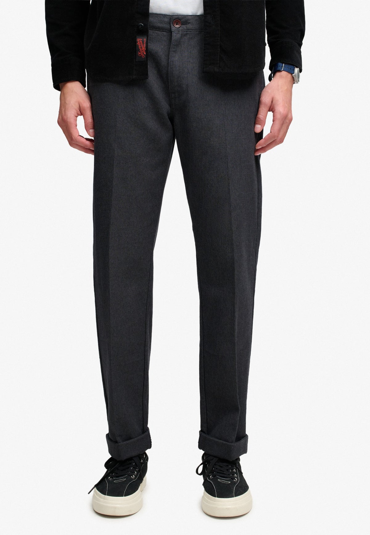 Superdry Premium Textured Regular Chino in Textured Charcoal angled view on model
