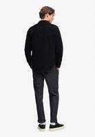 Superdry Premium Textured Regular Chino in Textured Charcoal angled view on model