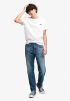 Superdry Vintage Tapered Jeans in Buck Blue angled model view