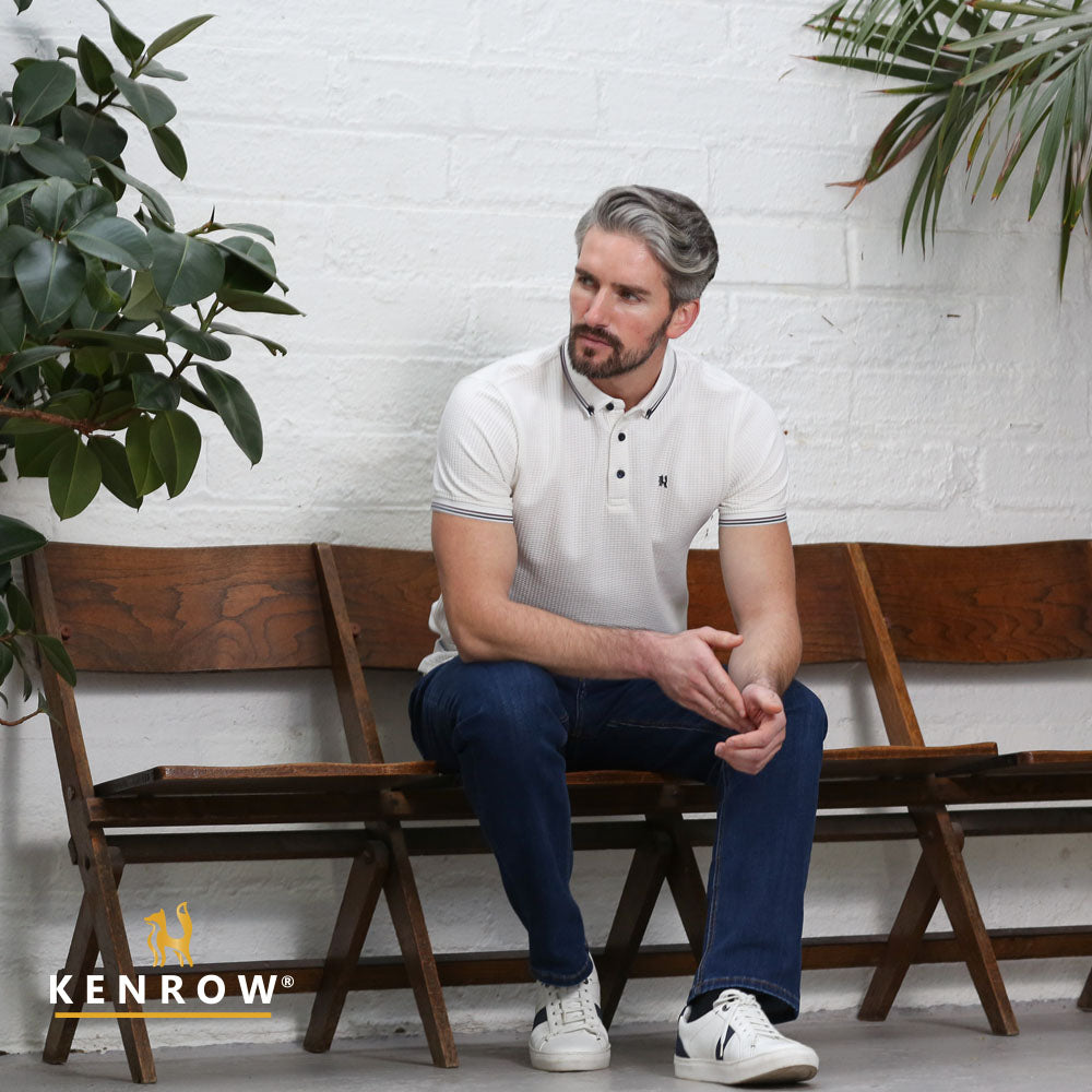 Kenrow Marcel cream textured polo shirt worn by model, seated front view