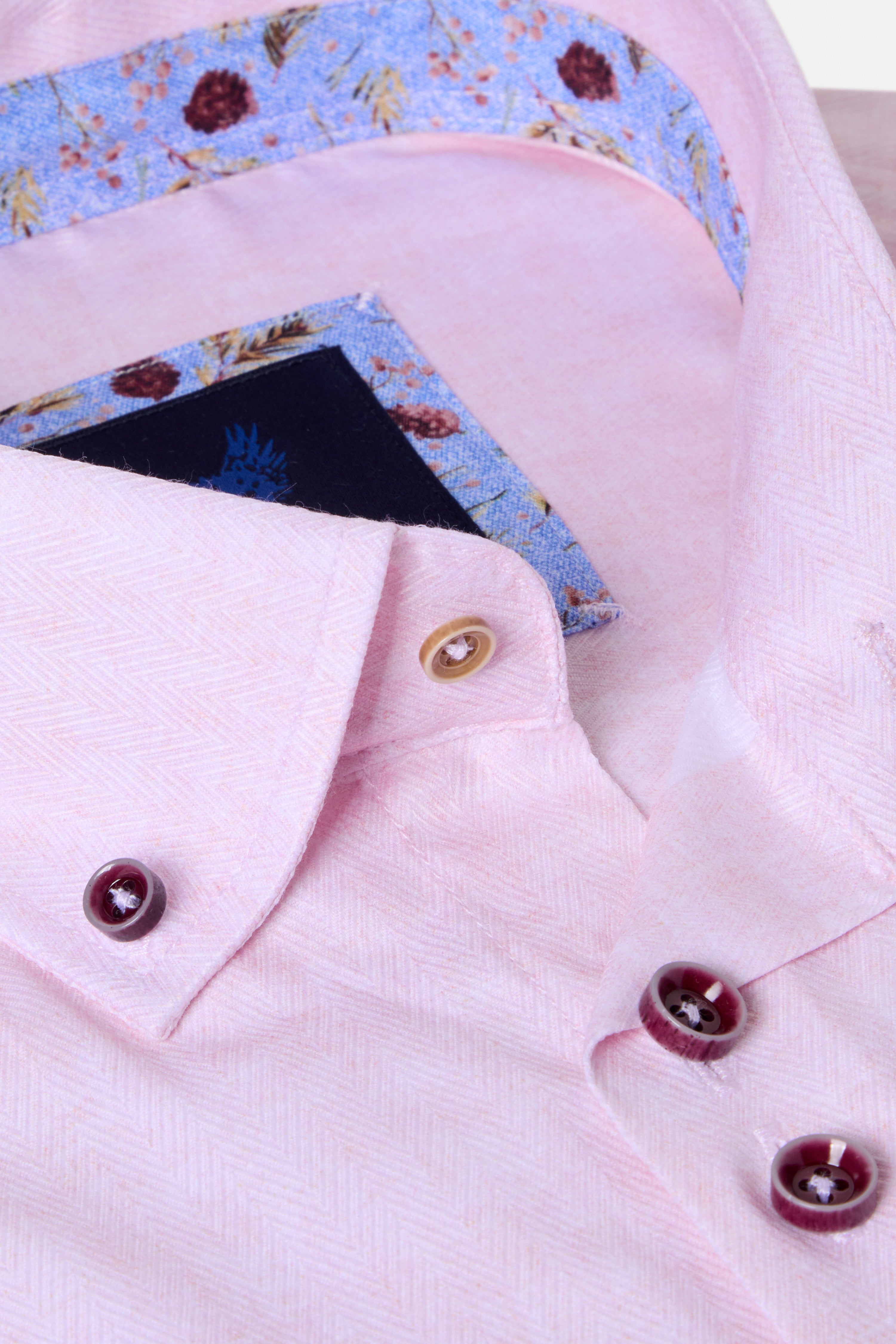 Pink button down shirt showing collar detail 
