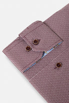 Benetti Riga Long Sleeve Plum Shirt cuff close-up with patterned plum fabric and brown buttons