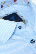 Benetti Riga Long Sleeve Sky Shirt in SKY, close-up of the collar and buttons with branded label and floral inner trim.