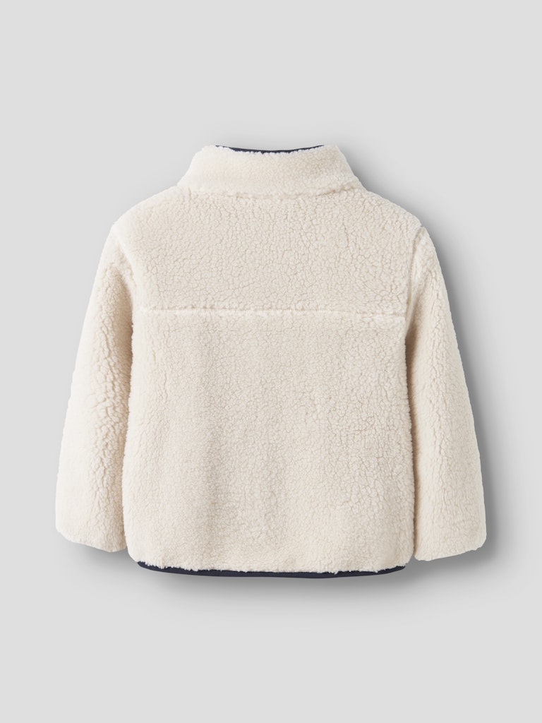 Beige fleece jacket on a light gray background
