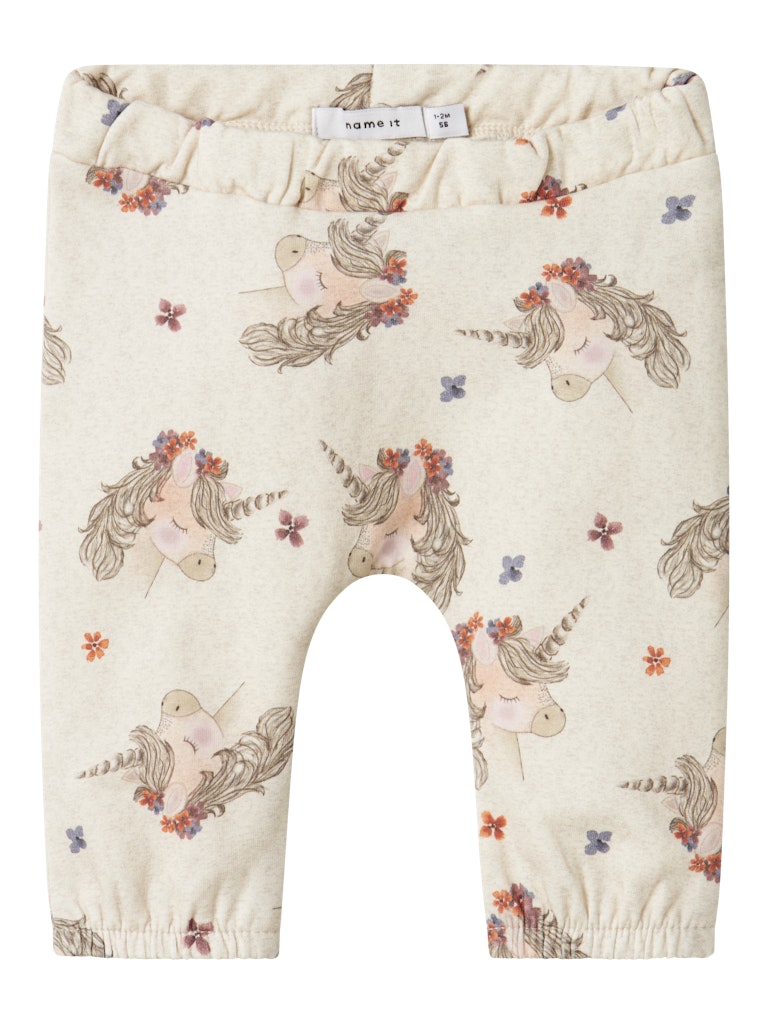 Baby leggings with unicorn pattern on a white background