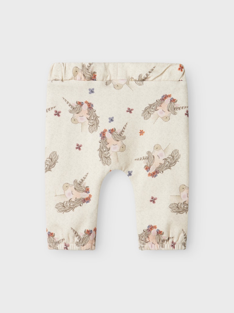 Baby leggings with unicorn pattern on a white background