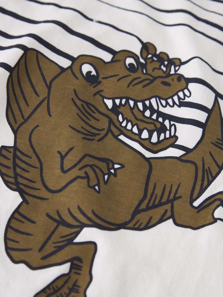 Vilasse white top with hanging dinosaur detail-Close up
