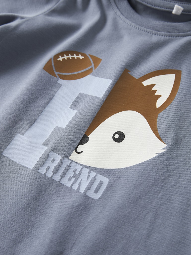 Gray t-shirt with a fox face and football graphic on a gray background