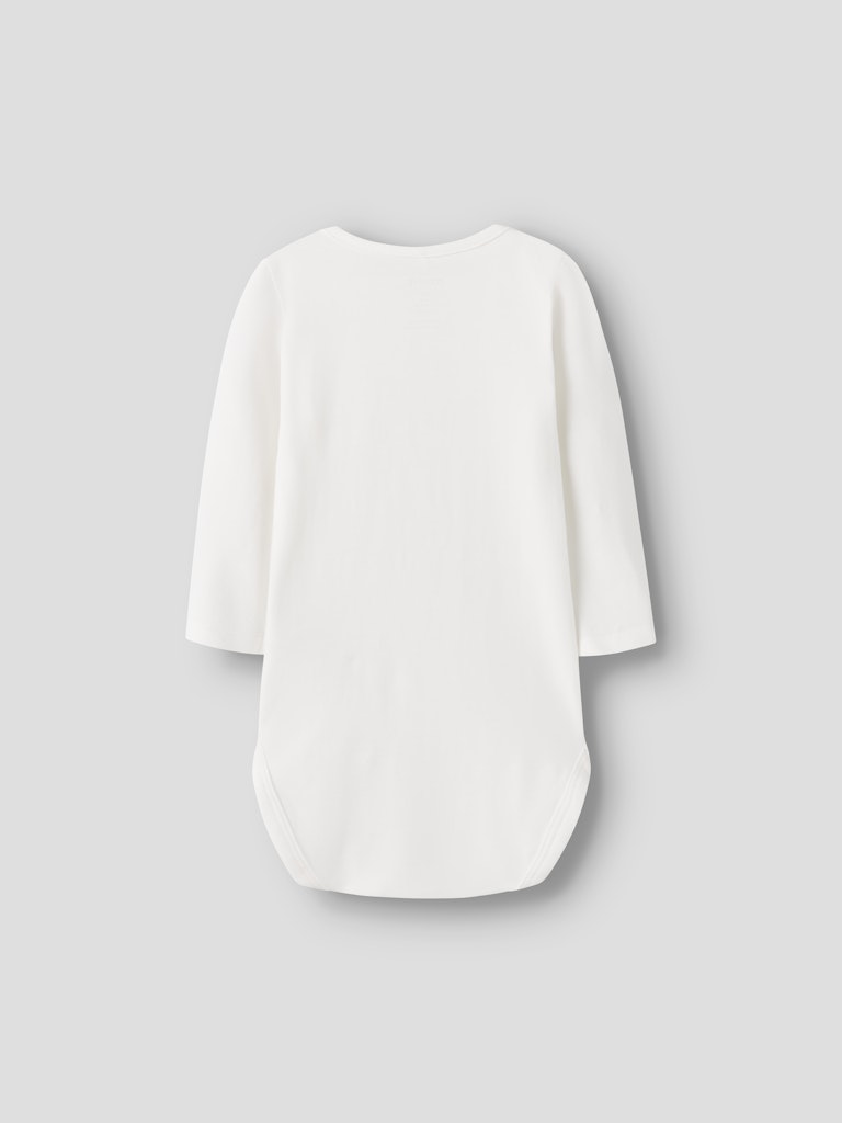 White baby one piece on a light gray background