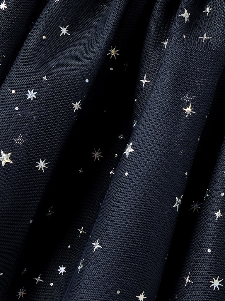 Navy blue fabric with silver star patterns