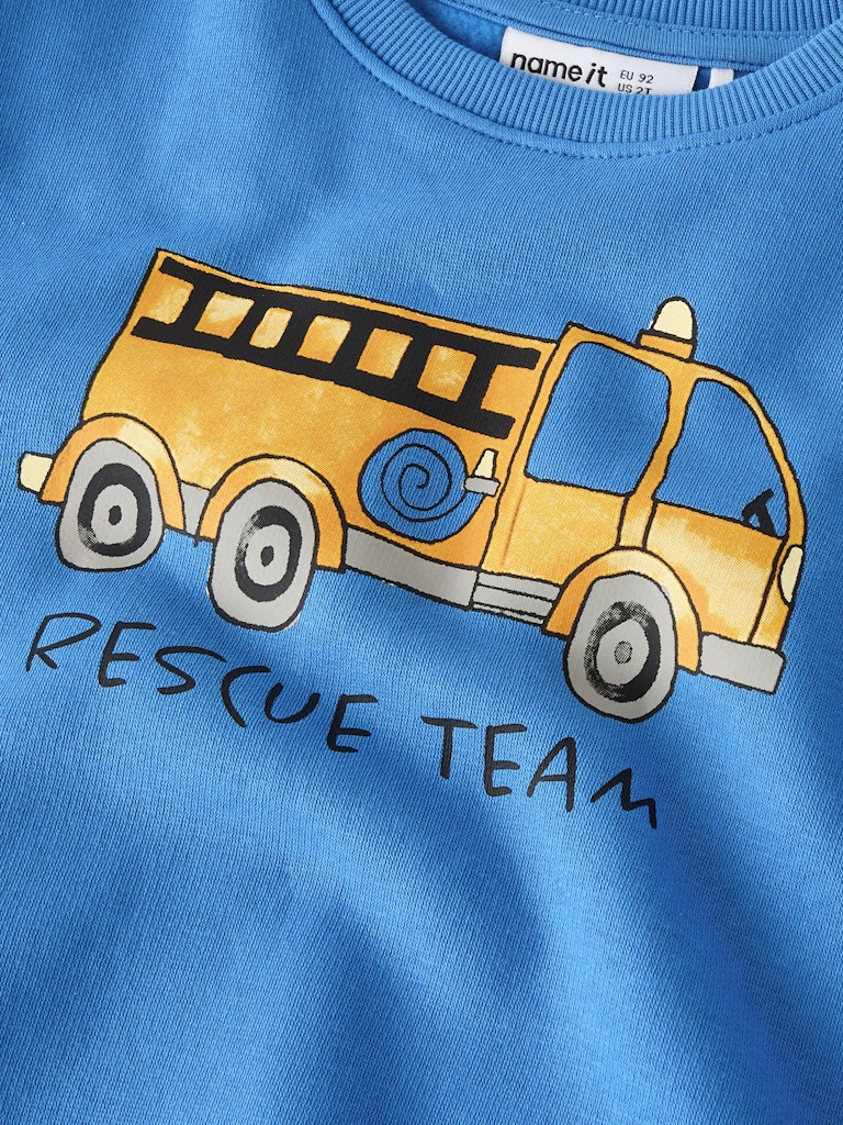 Blue shirt with a yellow bus graphic and 'Rescue Team' text on a blue background