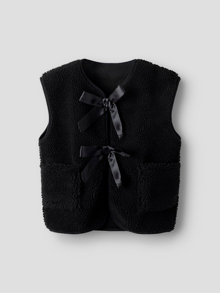 Black fleece vest with ribbon details on a light gray background