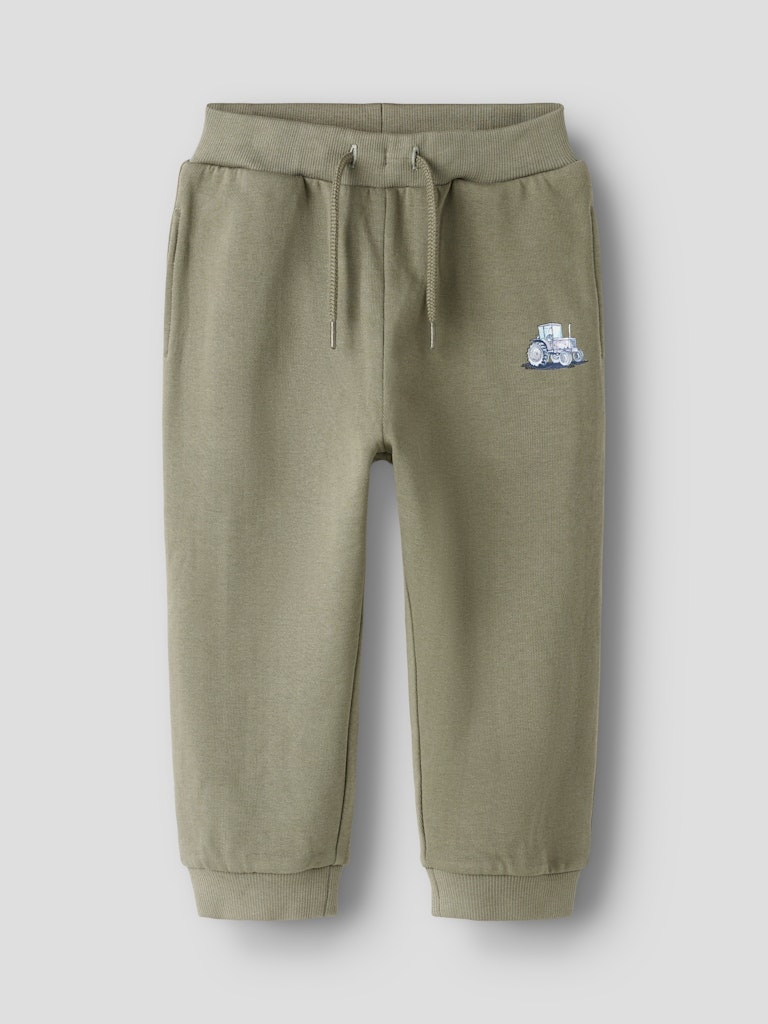 Green jogger pants with a small logo on a light gray background