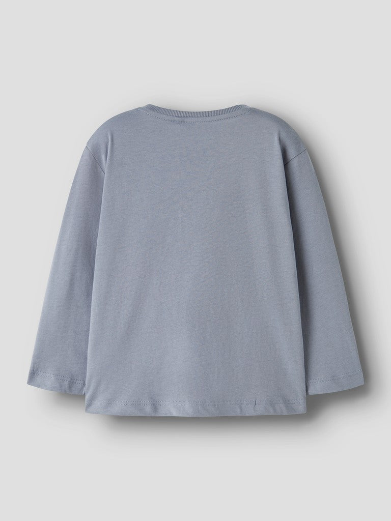 A light blue-gray long-sleeve t-shirt shown from the back, laid flat against a neutral light gray background.