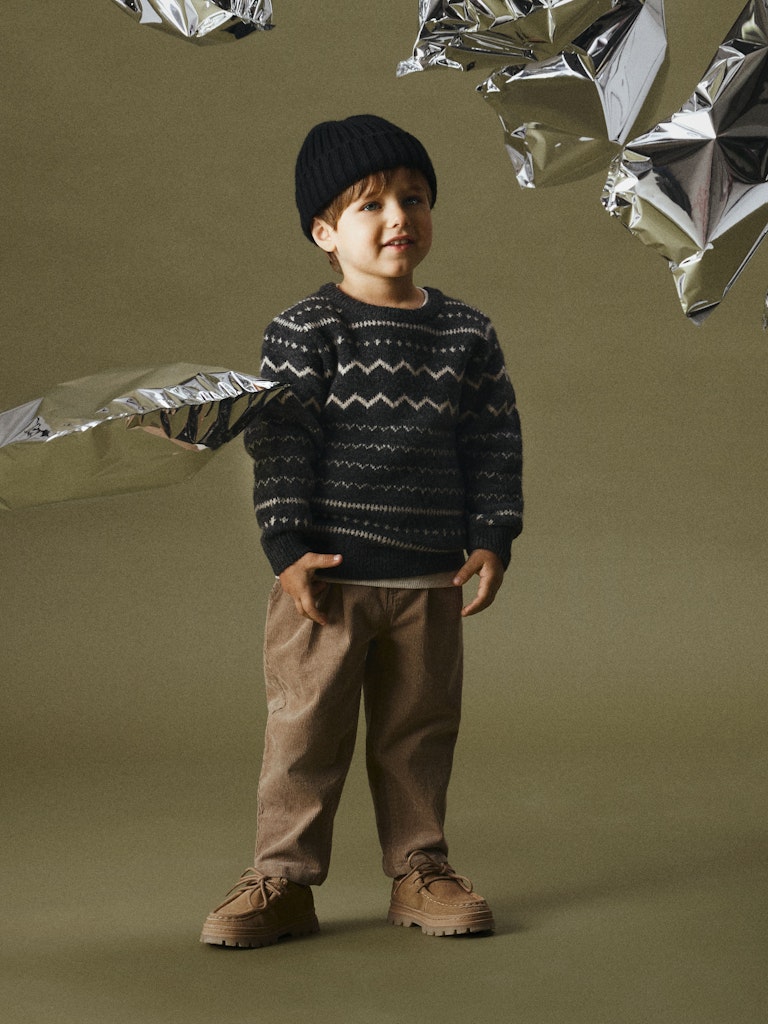 Soremi Obsidian Knit-Little model wearing