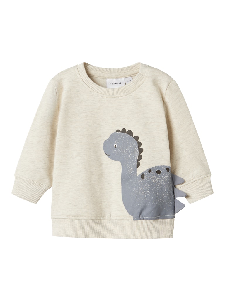 Beige sweater with a dinosaur design on a white background