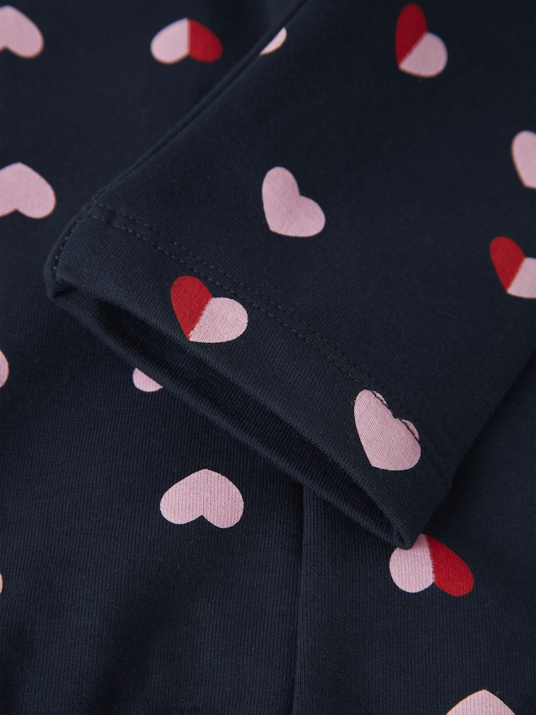 Navy leggings with pink and red heart pattern-Close Up View