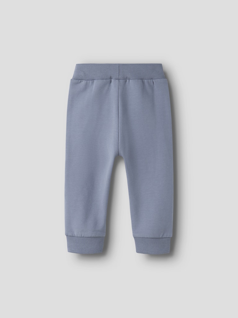 Blue pants on a light gray background