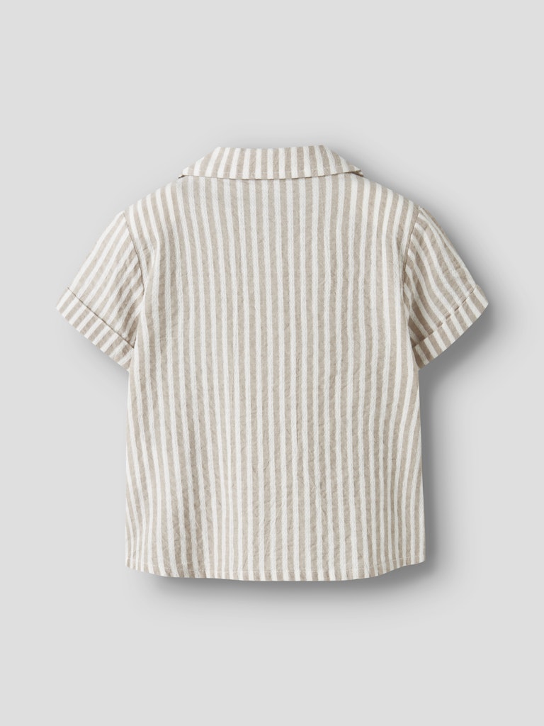 Back view of a striped shirt on a light gray background