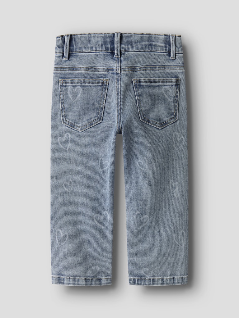 Blue denim jeans with heart patterns on a light gray background