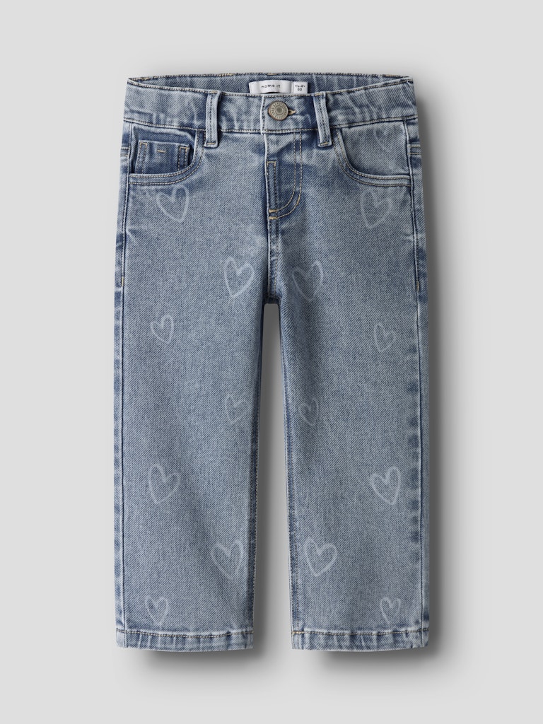 Blue jeans with heart patterns on a light gray background